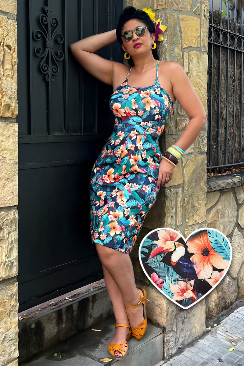 A model wearing a Cross Strap Pencil Dress in Black Toucan Print