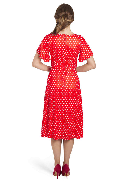 Model photo of Crossover Bust Red Polka Dot Dress