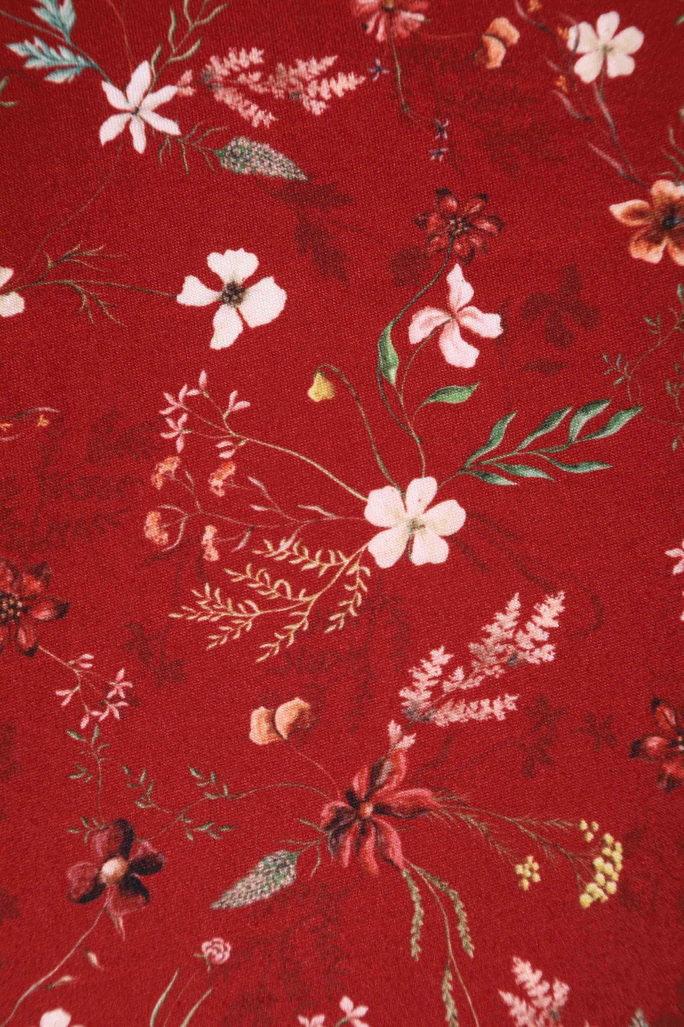 Close up view of Dainty Floral Tea Dress in Burgundy