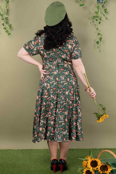 A model wearing a Dark Green Woodland Sleeved Dress