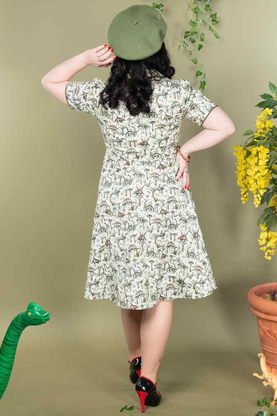 A model wearing a Dinosaur Forest Shirt Dress