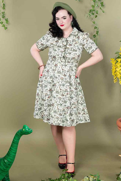 A model wearing a Dinosaur Forest Shirt Dress