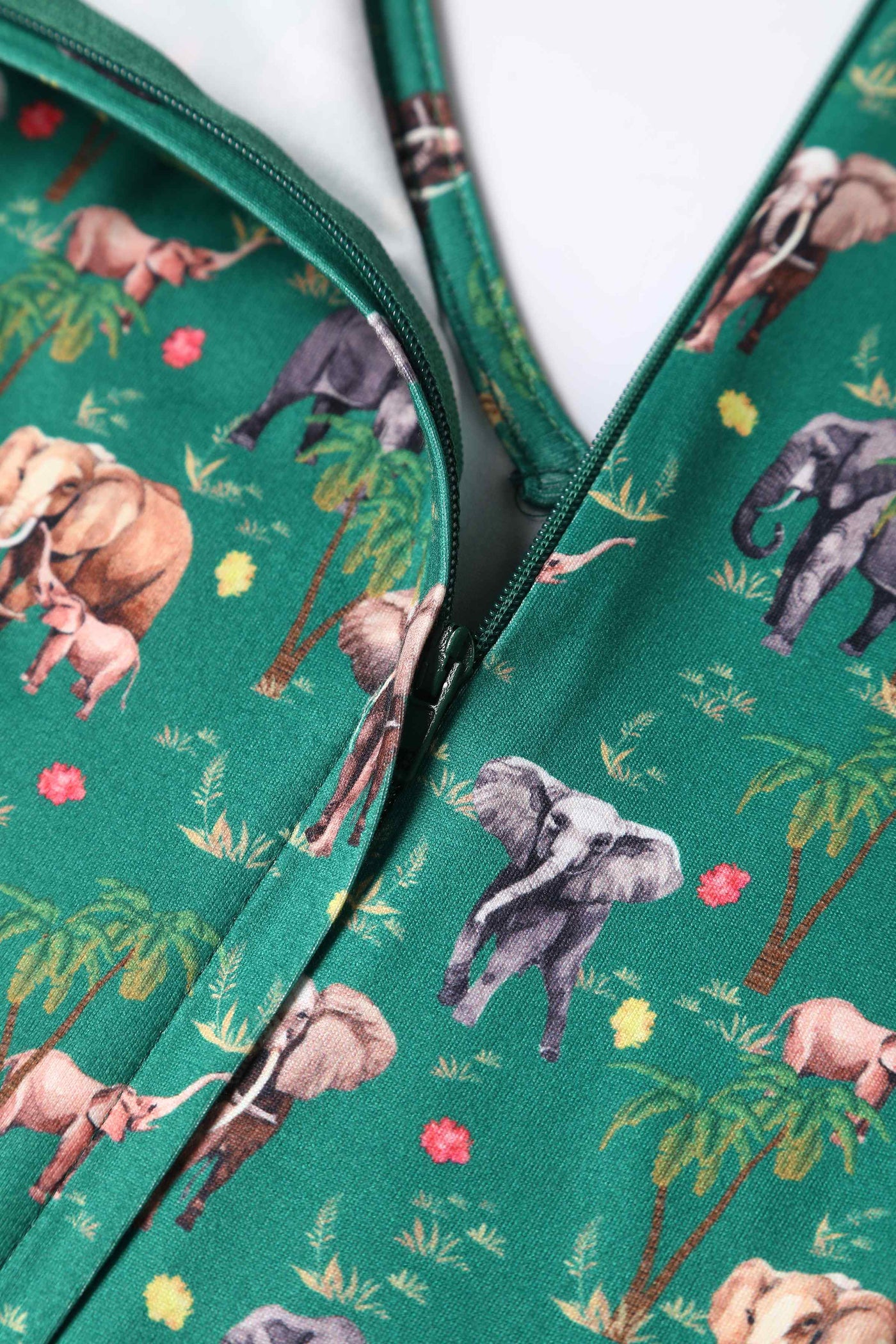 Close up view of Elephant Print Flared Dress in Green