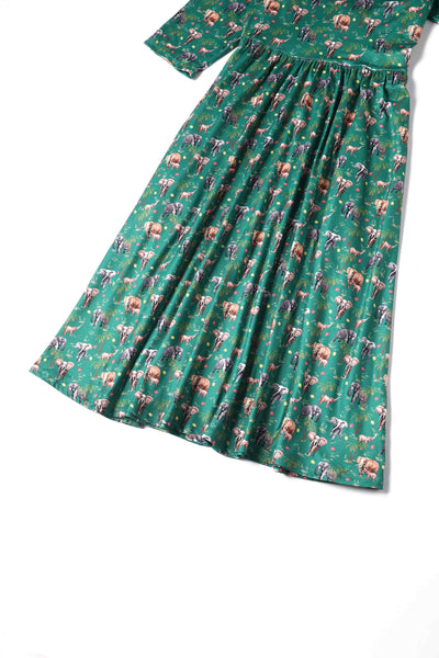 Close up view of Elephant Print Flared Dress in Green