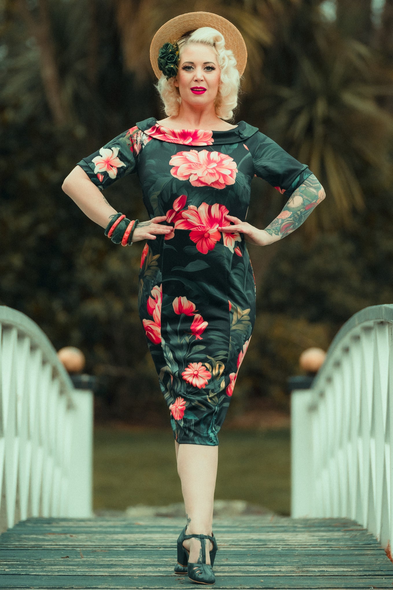 A model wearing a Fitted Off Shoulder Dress In Tiger Print