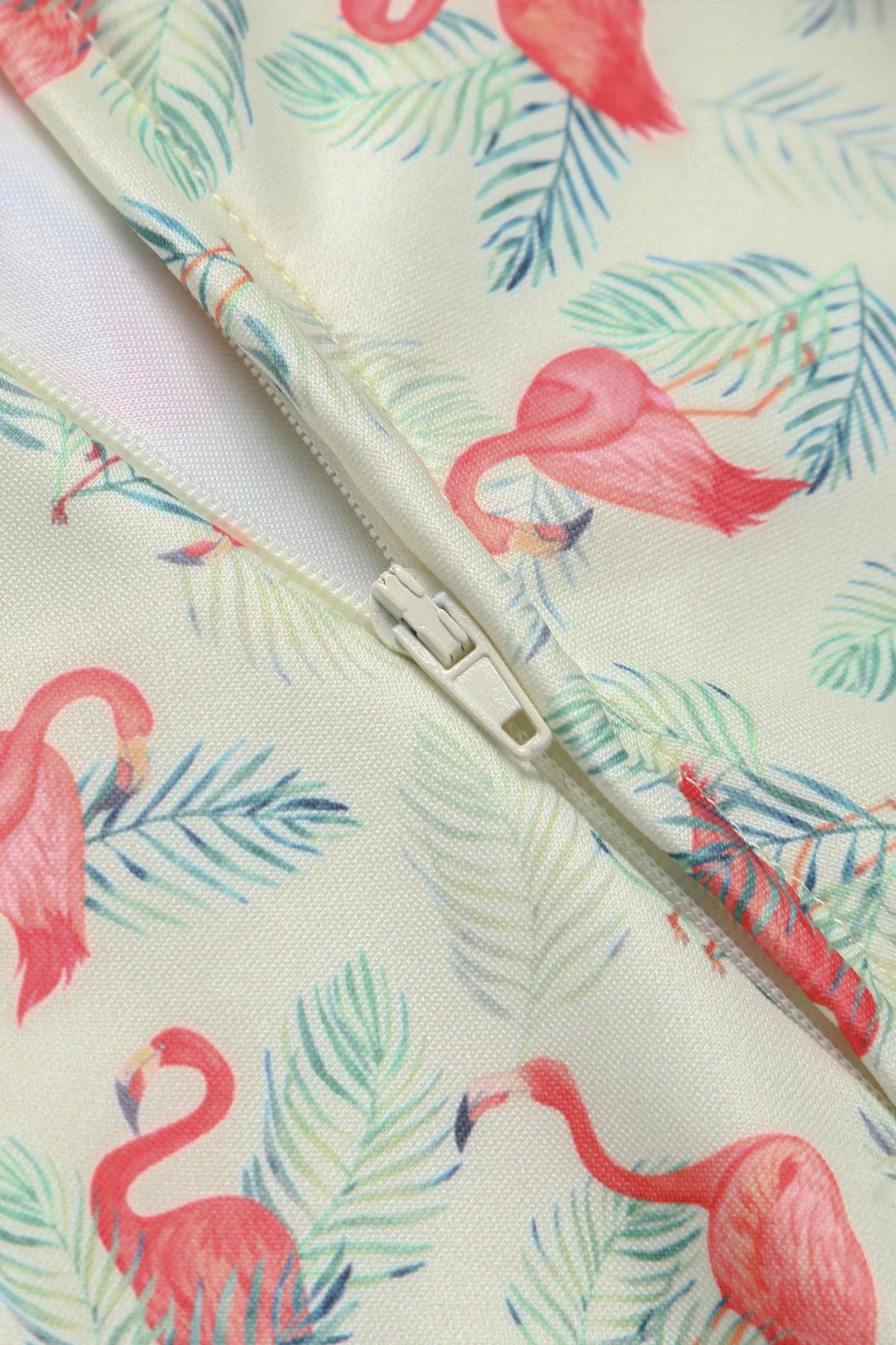 Close up View of Flamingo Off Shoulder Dress in Cream and Pink