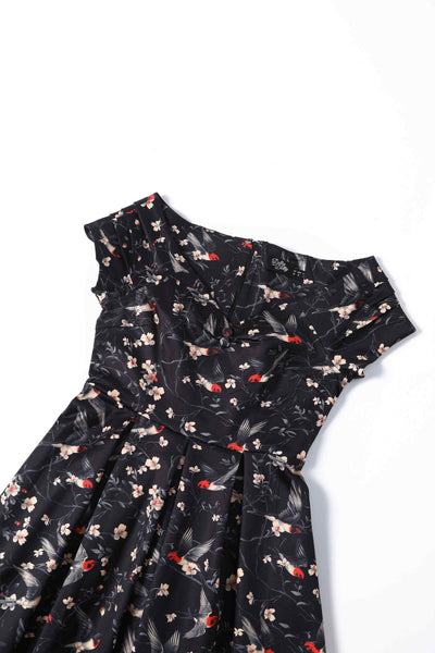 Close up view of Floral & Swallow Off Shoulder Dress