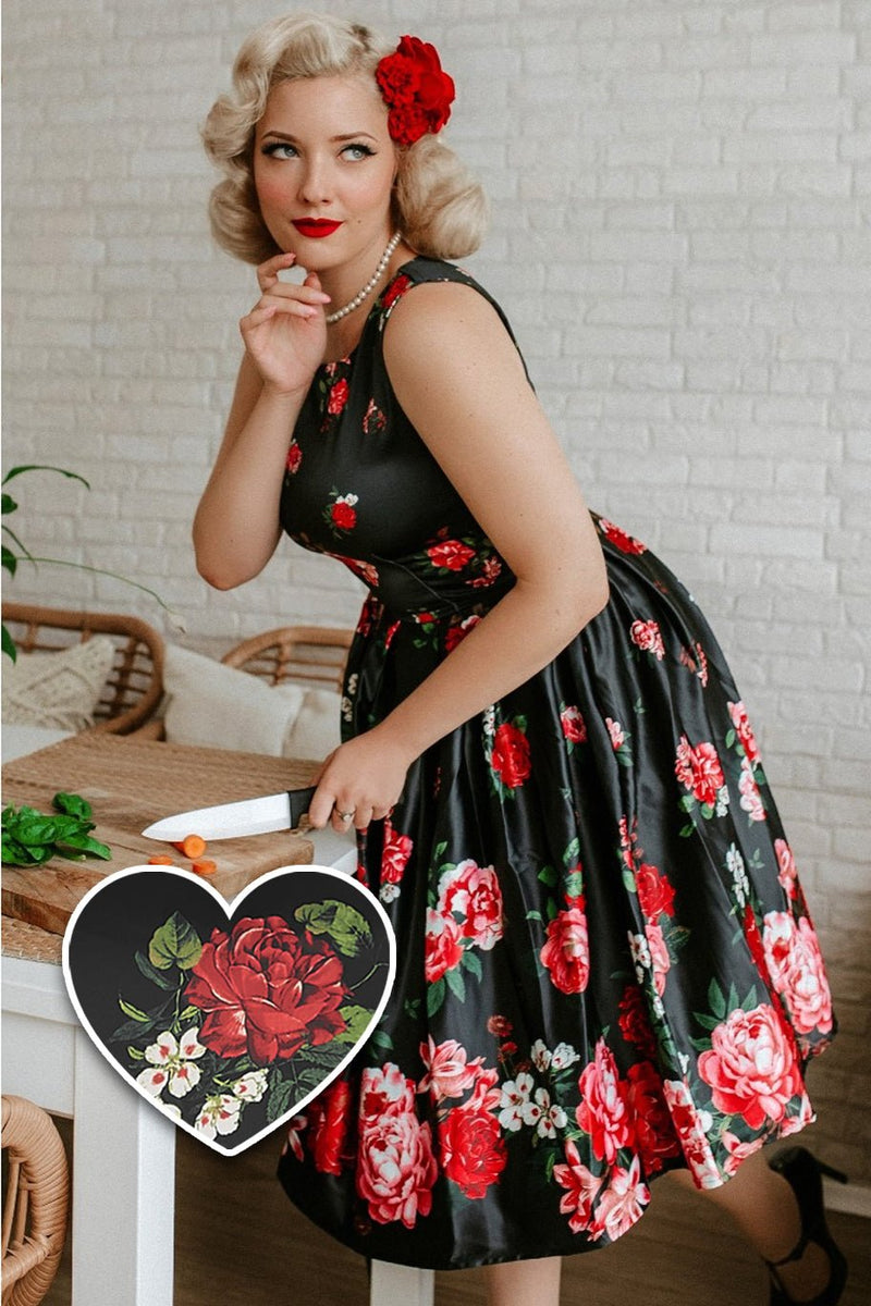 A model wearing a Floral Roses Satin Flared Dress in Black Pink