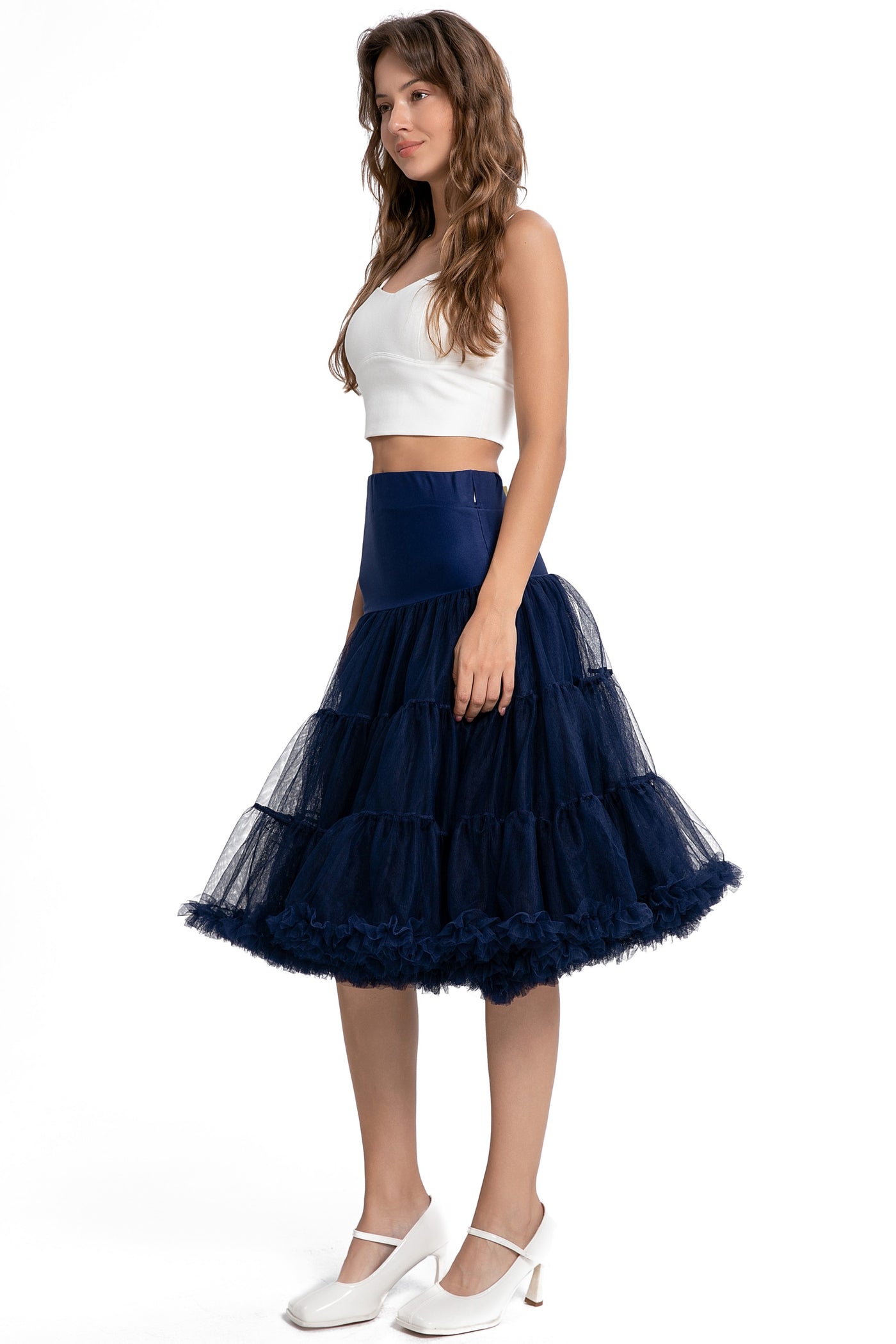 A model wearing a Fluffy Net Petticoat 25.5” In Navy Blue