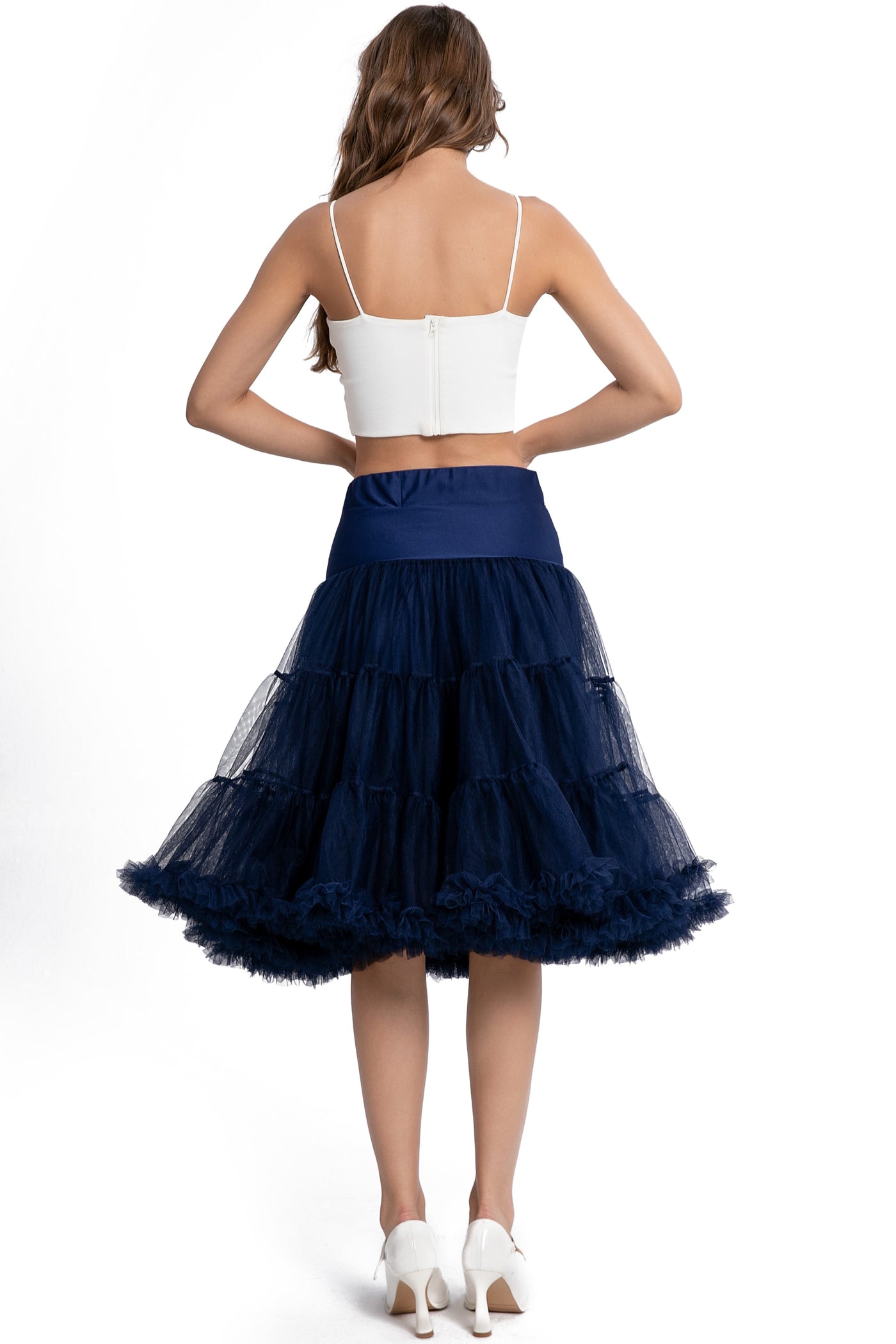 A model wearing a Fluffy Net Petticoat 25.5” In Navy Blue