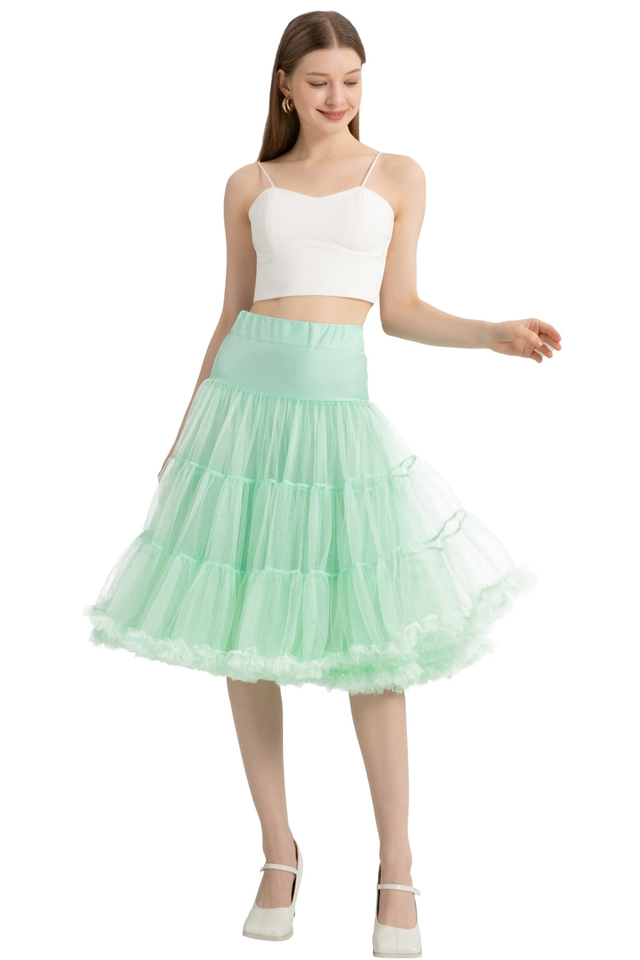 A model wearing a Fluffy Net Petticoat 25.5??� In Mint Green