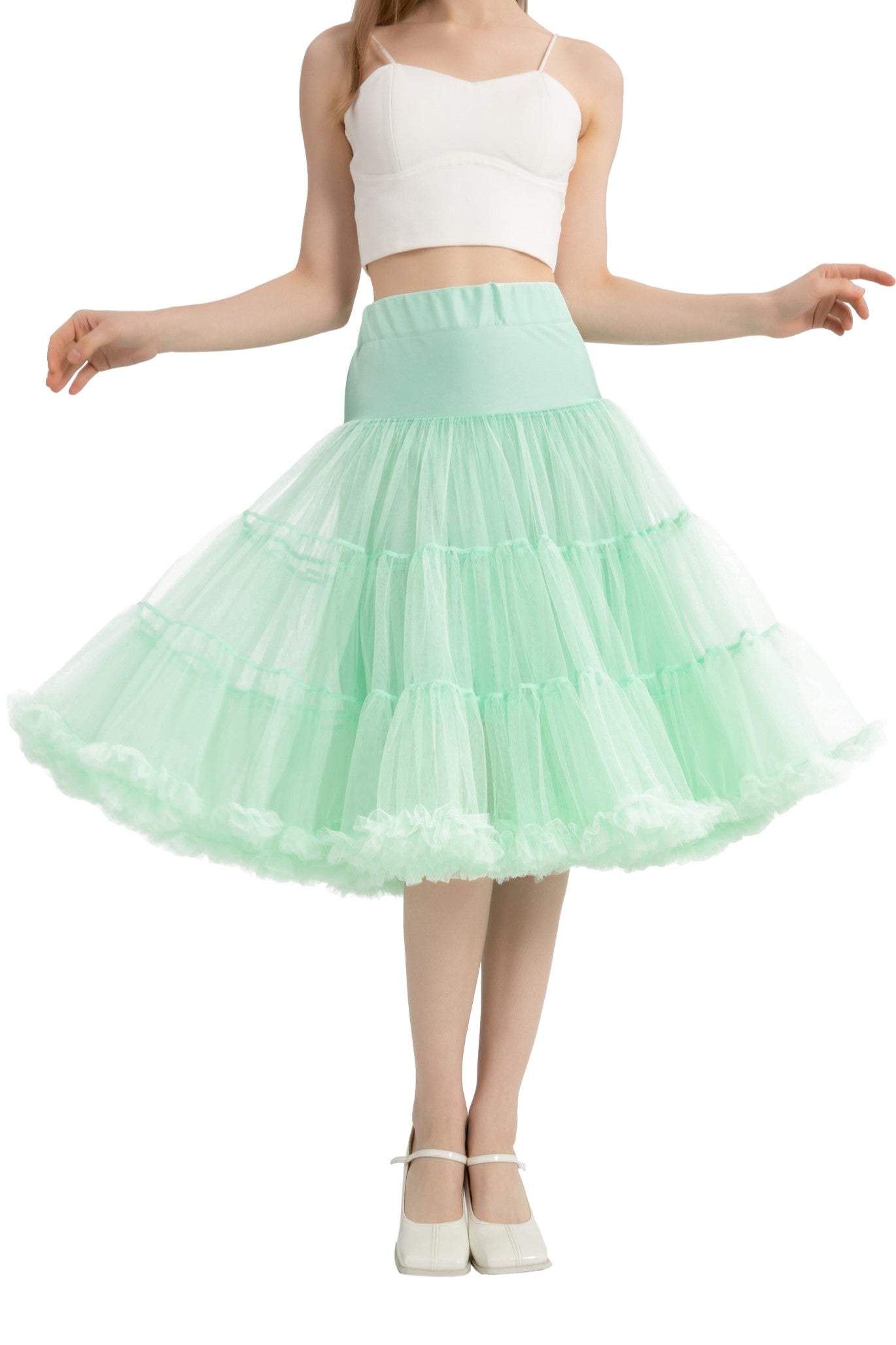 A model wearing a Fluffy Net Petticoat 25.5” In Mint Green