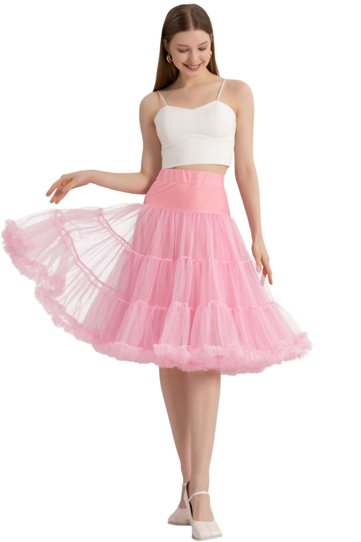 A model wearing a Fluffy Net Petticoat 25.5??� In Pastel Pink