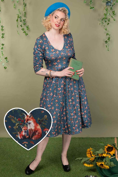 A model wearing a  Fox Den Print Dress