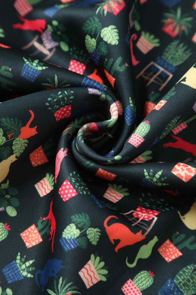 Close up of Green Cat & Plant Swing Dress