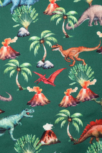 Close up view of Green Dinosaur & Volcano Swing Dress