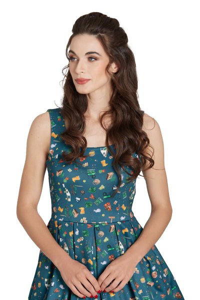 Model wearing Green Gardening Print Swing Dress