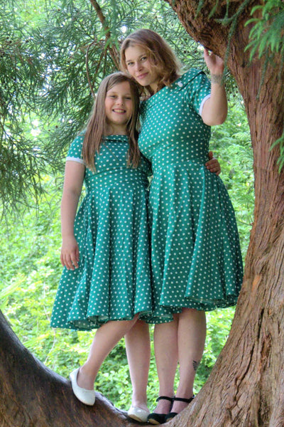 Mother and daughter wearing a Full Circle Green Polka Dot Swing Dress