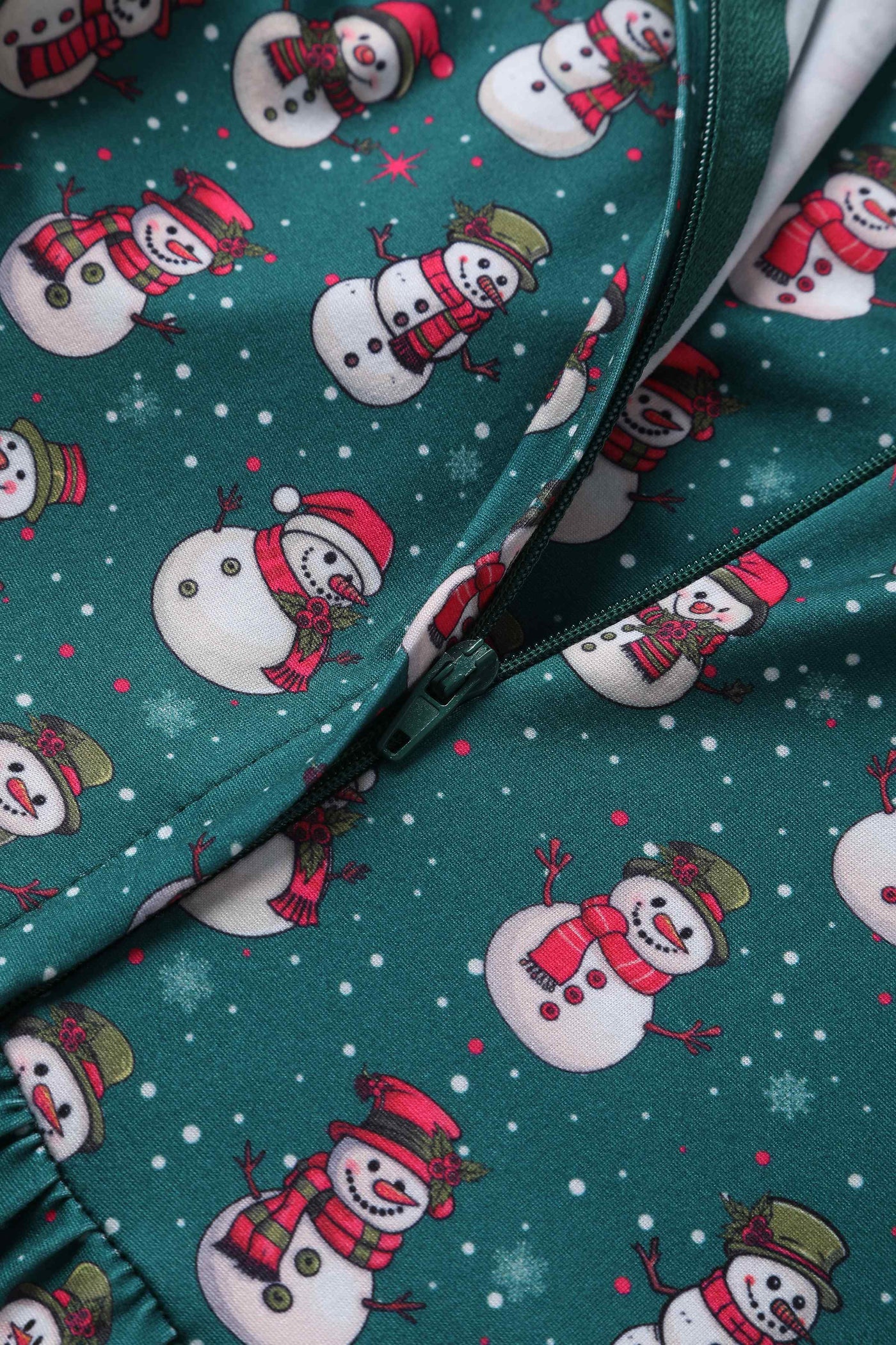 Close up view of Green Snowman Flared Dress