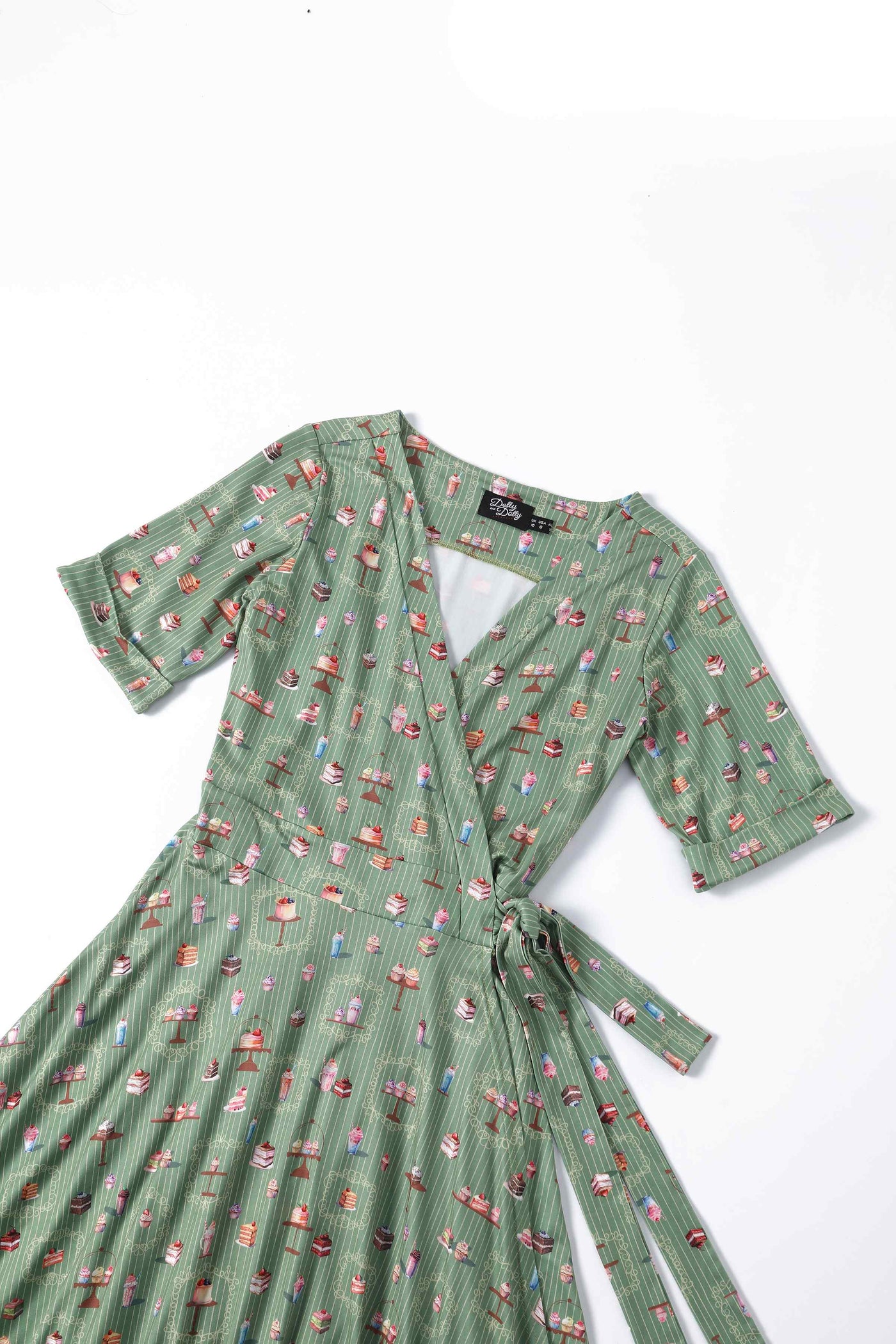 Close up view of Green Sweet Tooth Wrap Dress