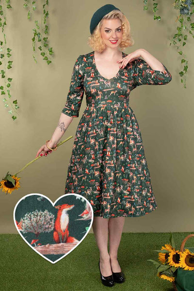 A model wearing a Green Woodland Dress