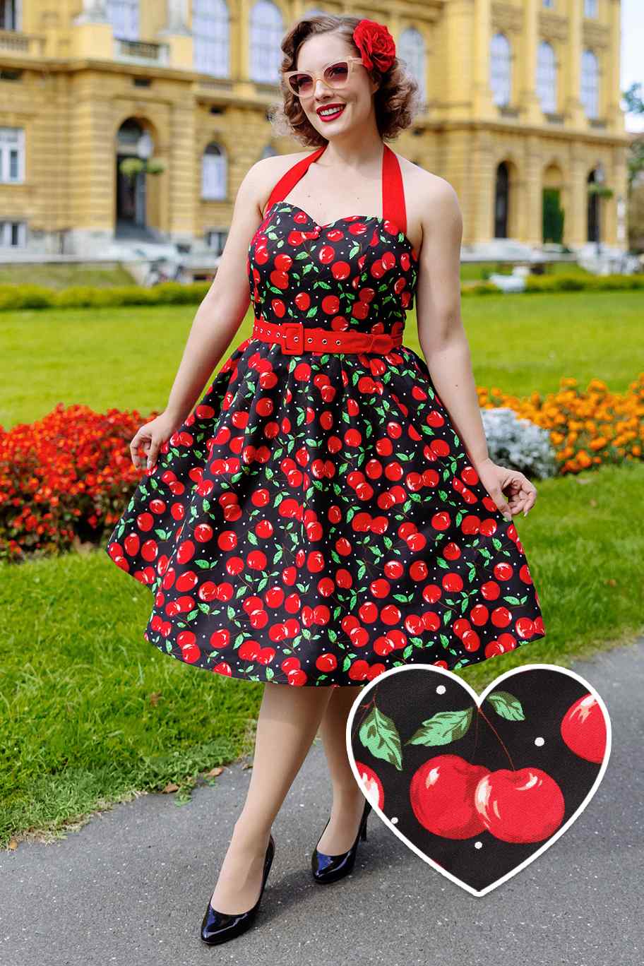 A model wearing a Halterneck Cherry Swing Dress