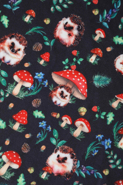 Close up View of Hedgehog and Mushroom Roll Collar Dress in Black
