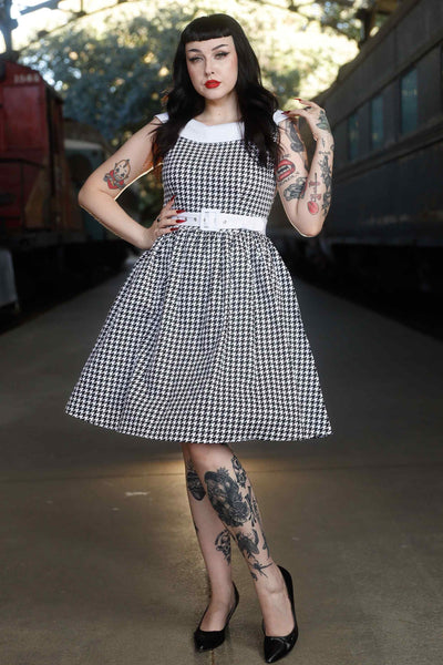 A model wearing Houndstooth Roll Collar Dress