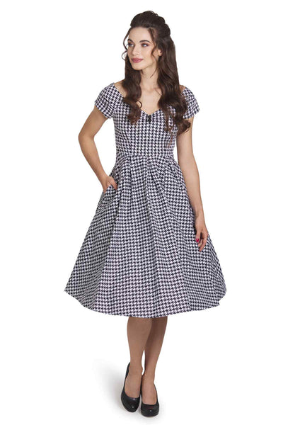 Model wearing Houndstooth Sleeved Full Circle Dress in Black/White