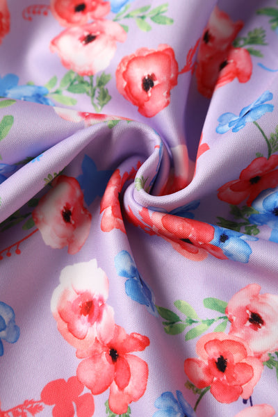 Close up view of Lilac Watercolour Floral Off Shoulder Dress