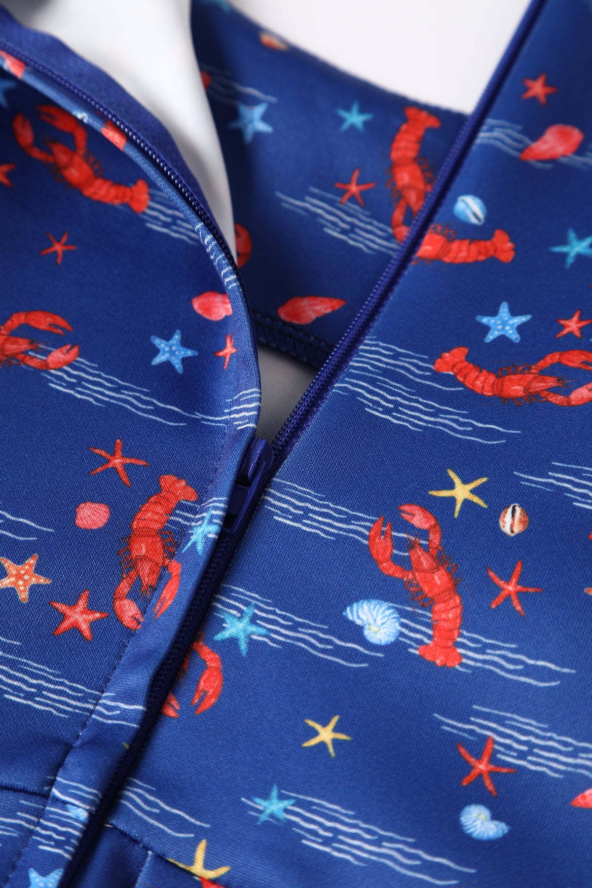 Close up view of Lobster Dark Blue Flared Dress