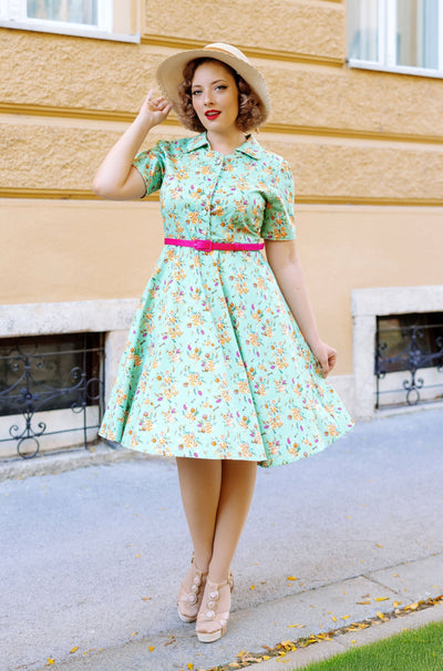 A model wearing a Mint Green Floral Shirt Dress