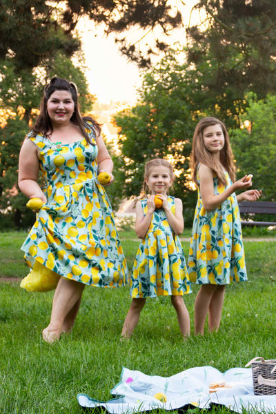 Mother and daughters in Summer Lemon Swing Dress