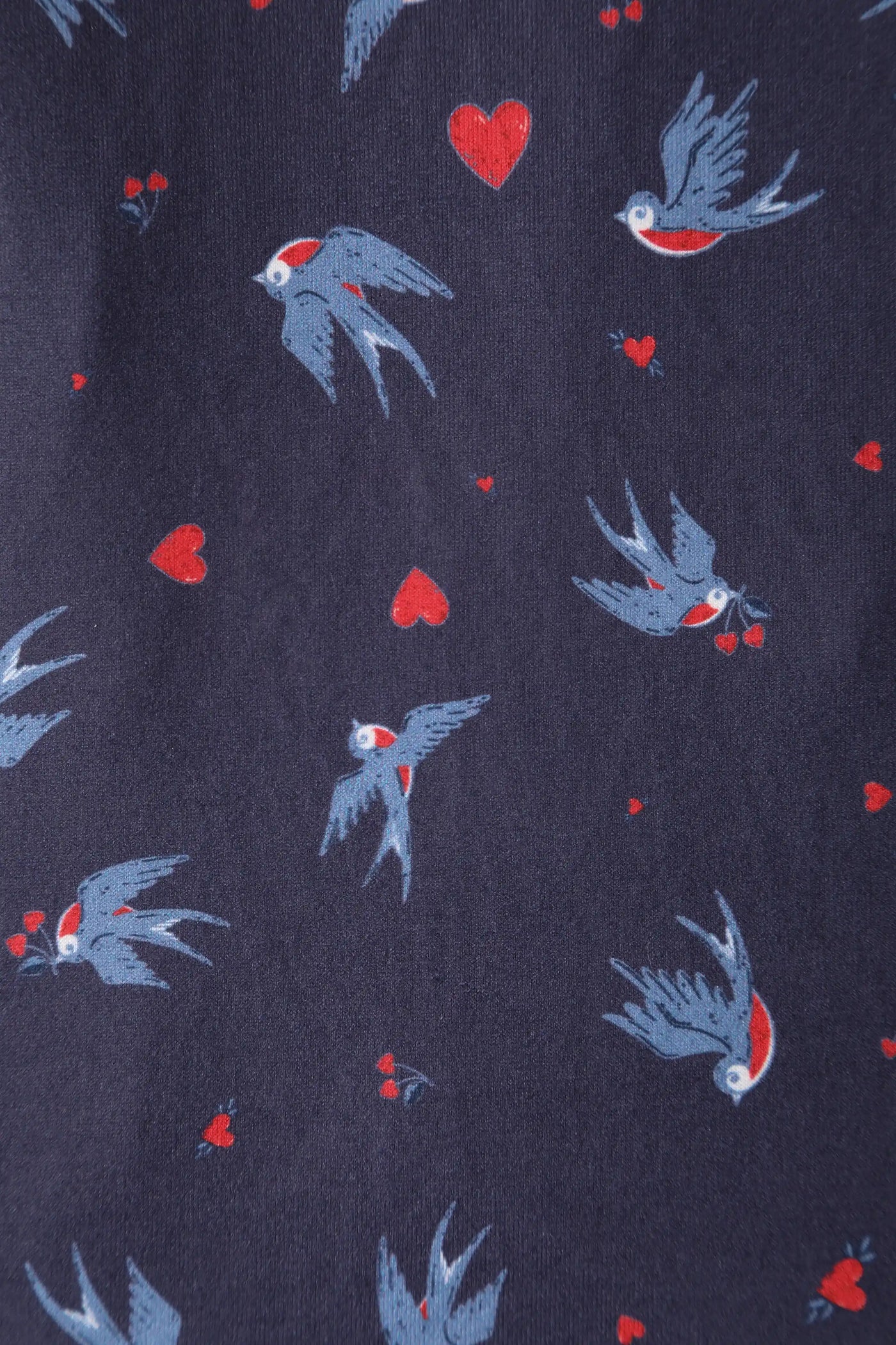 Close up view of Navy Blue Heart & Swallow Wrap Dress