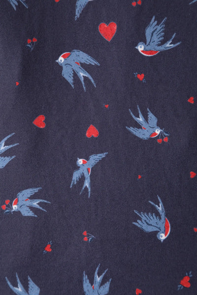 Close up view of Navy Blue Heart & Swallow Wrap Dress