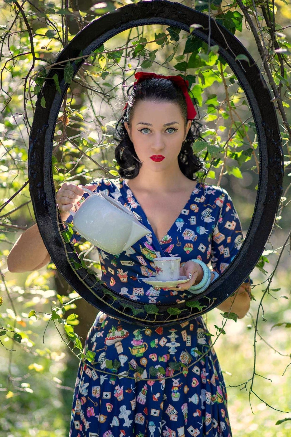 A model wearing a Navy Blue Wonderland Wrap Dress