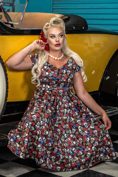 A model wearing a Off Shoulder 50s Rockabilly Skull Dress