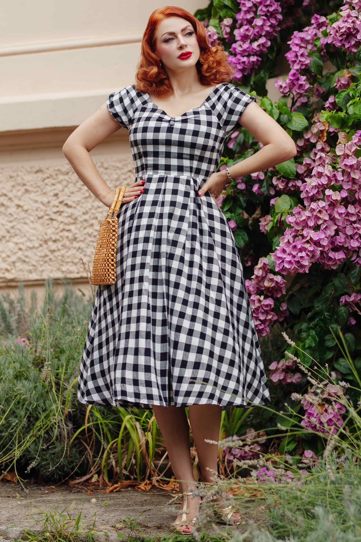 A model wearing an Off Shoulder Black Gingham Check Circle Dress