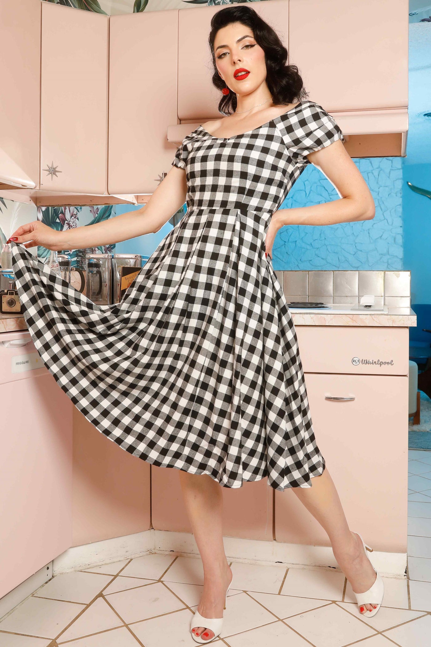 A model wearing a Off Shoulder Black Gingham Check Circle Dress