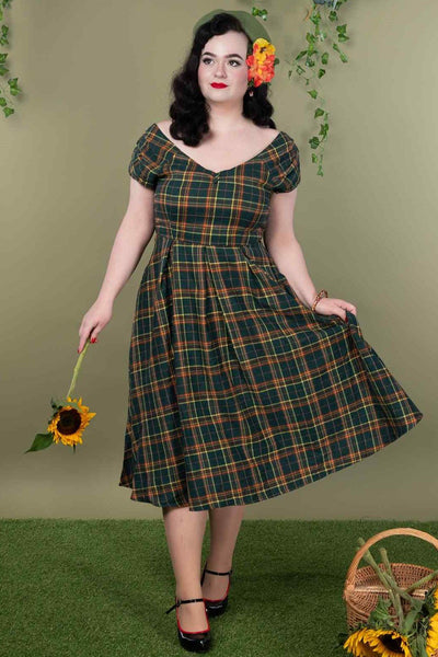 A model wearing an Off Shoulder Green Tartan Check Circle Dress