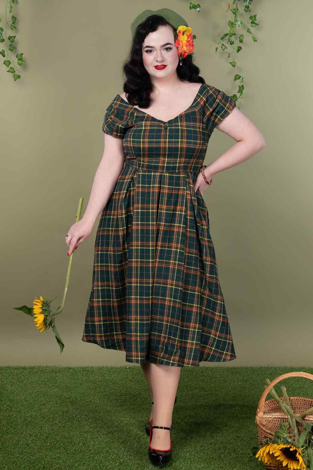 A model wearing an Off Shoulder Green Tartan Check Circle Dress