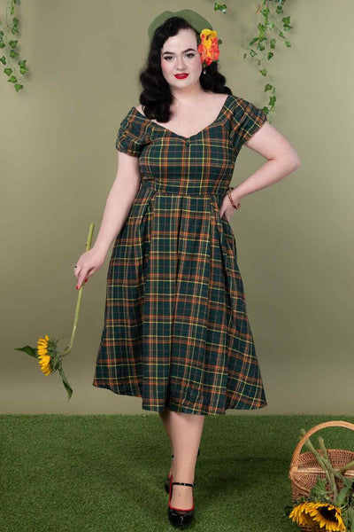 A model wearing an Off Shoulder Green Tartan Check Circle Dress