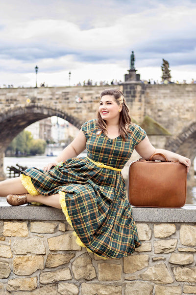 A lady wearing a Off Shoulder Green Tartan Check Circle Dress