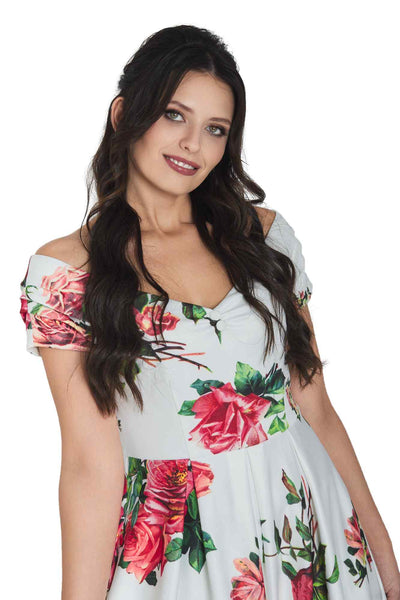 Model wearing Off Shoulder Rose Swing Dress In White