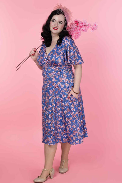 A model wearing a Blue Orchid Tea Dress