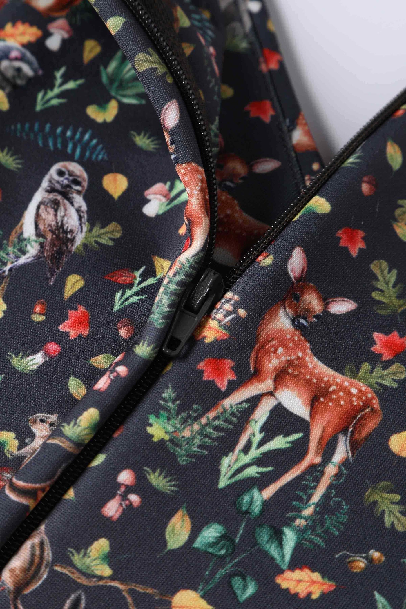 Close up view of Owl & Deer Off Shoulder Dress In Dark Green