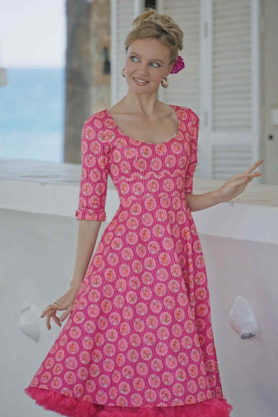 A lady wearing a Pink Baby Deer Midi Dress