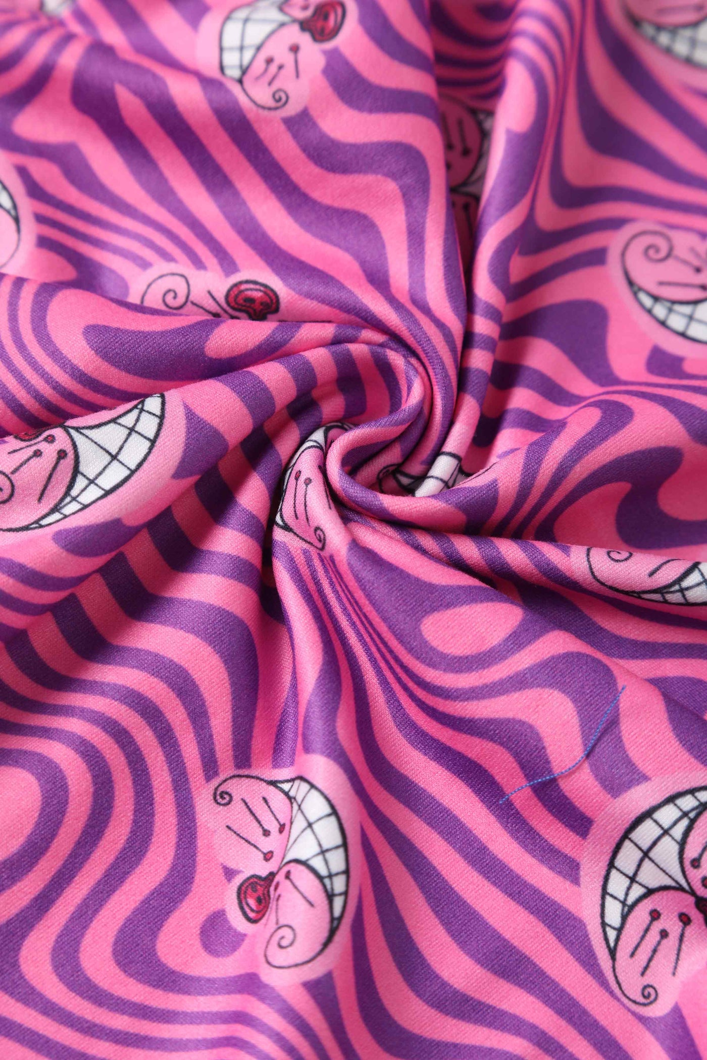 Close up view of Pink Cheshire Cat Smile Jumpsuit