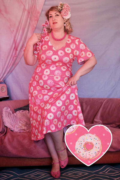 A model wearing a Pink Donut Short Sleeved Dress