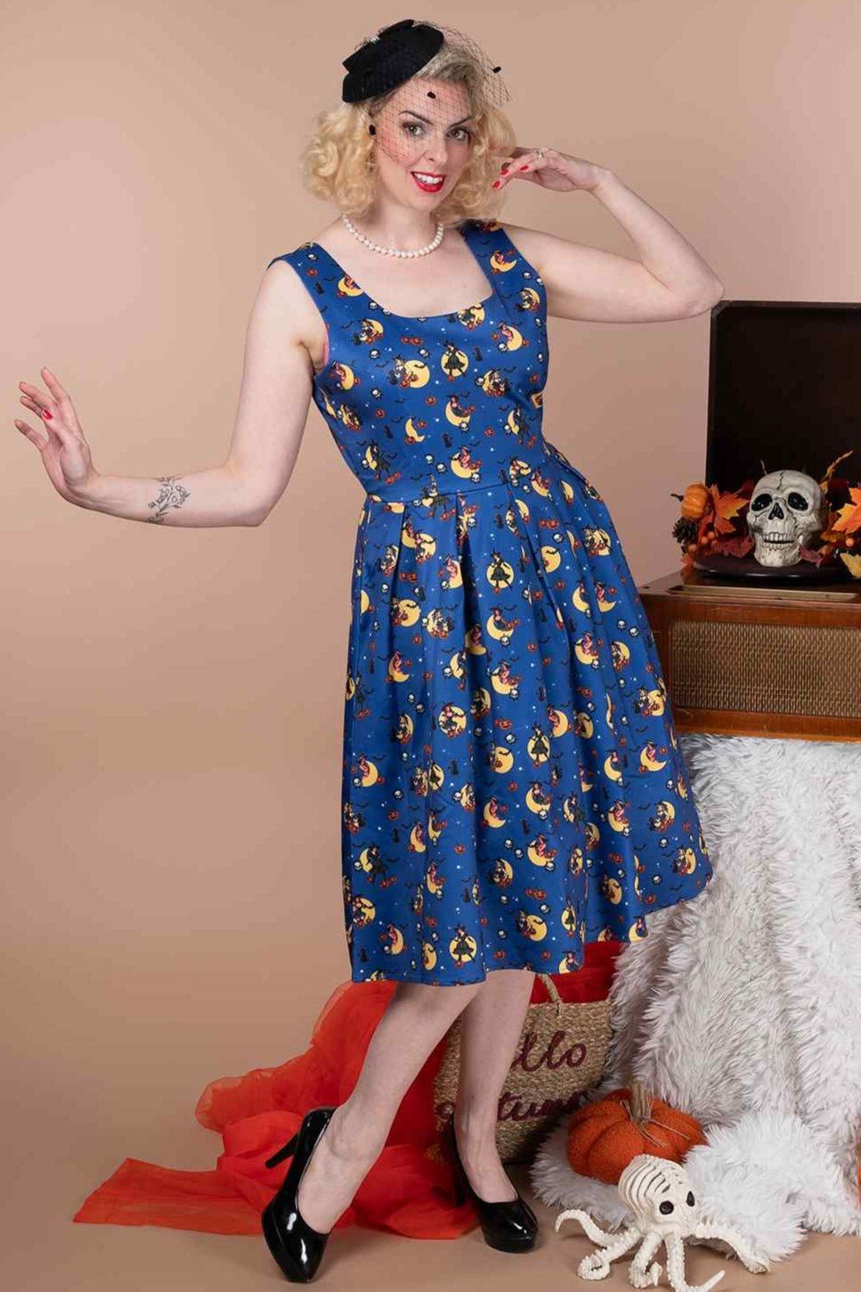 A model wearing a Witch Print in Blue Sleeveless Swing Dress